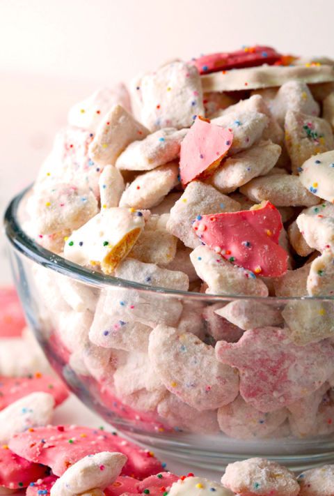 <p>For those of you who didn't enjoy these frosted sugar bombs at some point during your childhood, I'm sincerely sorry. Make up for lost time and delicious memories by throwing them into your puppy chow!</p>
<p><strong>Get the recipe from <a href="http://deliciouslyyum.com/frosted-animal-cracker-confetti-cake-muddy-buddies/" target="_blank">Deliciously Yum</a>.</strong></p>