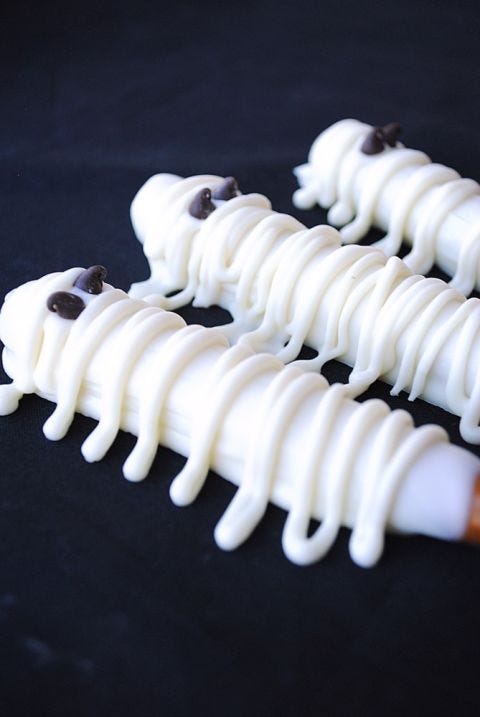 <p>Kids may love candy, but these offer the little ones something those sugar bombs don't: the chance to get messy, decorate the treats for themselves, and yes, maybe like the chocolate bowl clean.</p>
<p><strong>Get the recipe from <a href="http://crazylittleprojects.com/2013/10/yummy-mummy-treats.html" target="_blank">Crazy Little Projects</a>.</strong></p>