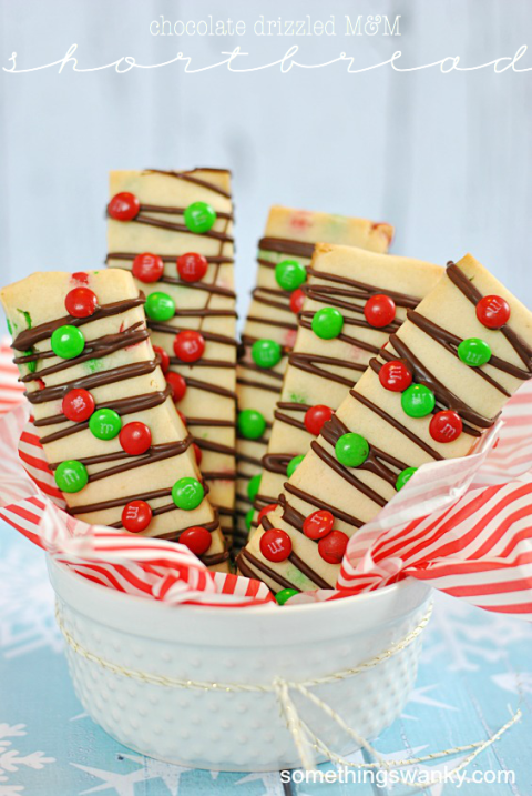 <p>These M&M stuffed shortbread cookies can be topped with any festive toppings you desire!</p> <p><strong>Get the recipe from <a href="http://www.somethingswanky.com/mm-shortbread-cookies/" target="_blank">Something Swanky</a>.</strong></p>
