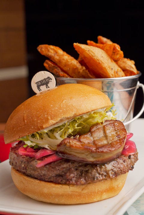 <p>In the quest for the most decadent burger, there's some tough competition. Vying for the top stop is <a href="http://www.holsteinslv.com/" target="_blank">Holsteins'</a> Billionaire Burger. Luckily for you, the name refers to how rich you'll <em>feel</em>, not how rich you have to be to buy the two-handed towering meal. This burger starts with a Kobe beef patty and just gets increasingly rich. Perched on the Kobe patty is port-onion marmalade, truffle mayo, and a generous helping of foie gras — yes, foie gras!</p>
<p><em><strong>Holsteins Shakes and Buns:</strong> 3708 S Las Vegas Blvd, Las Vegas, NV 89109; (702) 698-7940; <a href="http://www.holsteinslv.com/" target="_blank">holsteinslv.com</a></em></p>