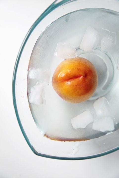 <p>Submerge the peaches in a bowl of ice water, and allow them to cool completely. Don't skip this step, as it's important to cool the peaches down quickly, in order to stop the cooking process, so that they don't become mushy.</p>