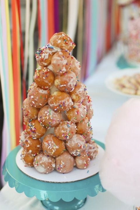 <p>This whimsical tree is easy to assemble with a cone, some store-bought donuts and sprinkles.</p> <p><strong>Get the recipe from <a href="http://tikkido.com/node/668" target="_blank">Tikkido</a>.</strong></p>