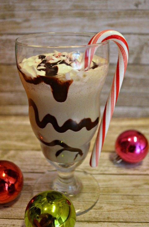 <p><br /><strong>Get the recipe from <a href="http://www.oneartsymama.com/2014/11/candycanecocktail.html" target="_blank">One Artsy Mama</a>.</strong></p>