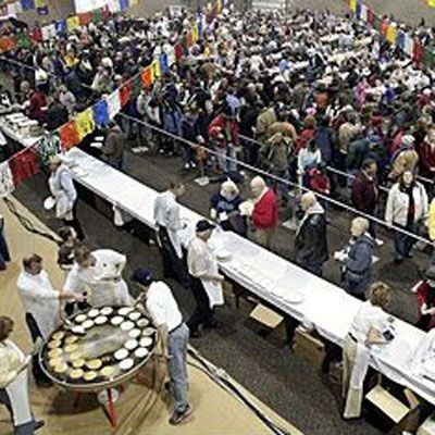 Hungry carnival-goers at the Fargo Kiwanis Club pancake fest gobbled up more than 34,000 flapjacks