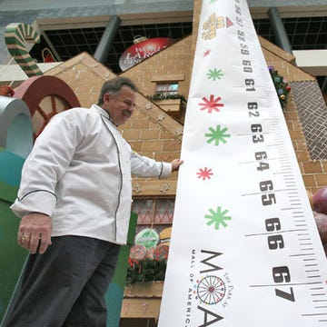 <p><b>Record Holder: Roger Pelcher</b></p>

<p>Location: Mall of America, Bloomington, Minnesota</p>

<p>November 22, 2006</p>

<p>It seems fitting that the largest gingerbread house was constructed in the largest mall in the United States&#mdash; seven Yankee Stadiums could fit inside the Mall of America! The gingerbread house measured more than 67 feet tall, and it took Pelcher and his team nine days to construct the 1,496-square-foot confection. We wonder how long it would take to eat it.</p>
