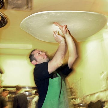 <b>Record Holder: Tony Gemignani</b>

<p>Location: Mall of America, Minneapolis, Minnesota</p>

<p>April 20, 2006</p>

<p>Pizza-wielding hotshot Tony Gemignani spun 17.6 ounces of dough for 2 minutes to form a pizza crust whose diameter topped out at 33.2 inches. Gemignani spun for the gold as part of the Food Network's Guinness World Records Week.</p>

