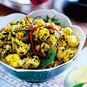 This savory alternative to traditional cauliflower adds some zest to the standard Thanksgiving dinner. It'll leave your company reassessing their view on the familiar vegetable when it's prepared in this Indian-inspired dish that packs in the flavor.<p><br /><b>Recipe: <a href="/recipefinder/poppy-seed-cauliflower-vegetarian-recipes" target="_blank">Poppy Seed-Crusted Cauliflower</a></b></p>