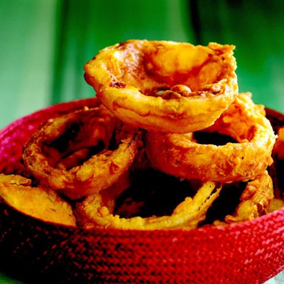 <p><b>Proper Amount of Oil:</b> When frying on the stove top in a deep-sided pan, about two inches of oil is generally an adequate amount.</p><br /><p><b>Recipe:</b> <a href="/recipefinder/buttermilk-onion-rings-recipe"><b>Buttermilk Onion Rings</b></a></p>