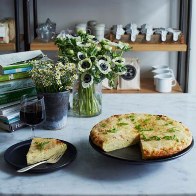 <p>Made with 18 eggs, two cups of cheese, and one cup of cream, this frittata makes a decadent brunch dish for a crowd.</p><p><b>Recipe: </b><a href="http://www.delish.com/recipefinder/potato-scallion-frittata-manchego-cheese-recipe-recipe-fw0113"><b>Potato-Scallion Frittata with Manchego Cheese</b></a></p>