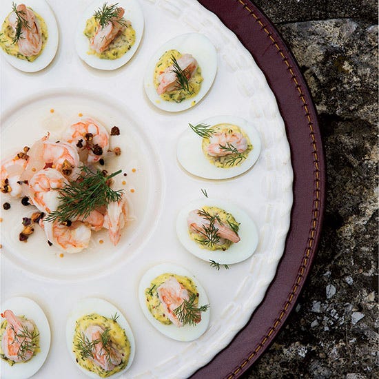 <p>To amp up his creamy dill-and-chive deviled eggs, Bobby Flay tops them with tangy pickled shrimp.</p><p><strong>Recipe:</strong> <a href="http://gogonow.org/recipefinder/deviled-eggs-pickled-shrimp-recipe-fw0514?"><strong>Deviled Eggs with Pickled Shrimp</strong></a></p>