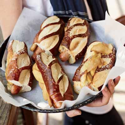 <p>Here is a terrific, if unlikely, combination of cinnamony sautéed apples with slices of sharp cheddar cheese, served on top of hot dogs tucked into pretzel rolls.</p><p><b>Recipe:</b> <a href="http://www.delish.com/recipefinder/hot-dogs-cheddar-sauteed-apples-recipe-fw0910" target="_blank"><b>Hot Dogs with Cheddar and Sautéed Apples</b></a></p>