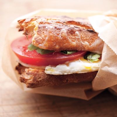 <p>This recipe calls for cheddar cheese, but you can switch in any favorite. Add a few strips of cooked bacon if you wish.</p>
<p><strong>Recipe:</strong> <a href="http://www.delish.com/recipefinder/ egg-tomato-breakfast-sandwich-to-go-recipe-mslo0413" target="_blank"><strong>Egg-and-Tomato Breakfast Sandwich To Go</strong></a></p>