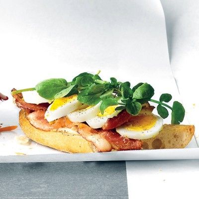 <p>A sliced hard-boiled egg, crispy bacon, and peppery watercress top off this open-faced take on a breakfast sandwich.</p><p><b>Recipe:</b> <a href="/recipefinder/open-faced-egg-bacon-watercress-sandwich-recipe-mslo0412" target="_blank"><b>Open-Faced Egg, Bacon, and Watercress Sandwich</b></a></p>