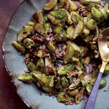 <p>The key to Michael Symon's deeply savory side dish is a dressing that includes anchovies, capers, mustard, and a little honey.</p><p><b>Recipe: </b><a href="/recipefinder/roasted-brussels-sprouts-capers-walnuts-anchovies-recipe-fw1111" target="_blank"><b>Roasted Brussels Sprouts with Capers, Walnuts, and Anchovies</b></a></p>