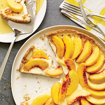 <p>An almost-instant crust, made with vanilla wafer cookies and smoked almonds, is the secret to this simple and unusual tart.</p><p><b>Recipe: </b><a href="http://gogonow.org/recipefinder/creamy-peach-tart-smoky-almond-crust-recipe-fw0811%22 target="_blank"><b>Creamy Peach Tart with Smoky Almond Crust</b></a></p>