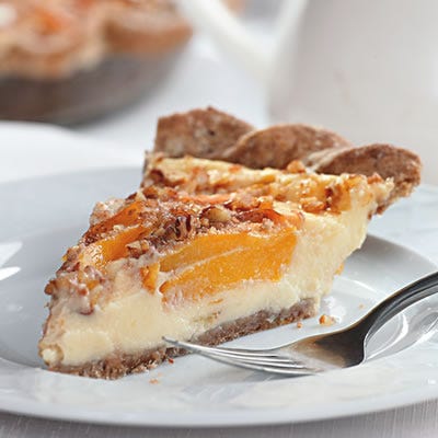 <p>We use low-fat milk along with nonfat Greek yogurt in the creamy custard for this peach pie. The yogurt gives the custard a smooth texture without using cream or too many egg yolks. A slice is just as delicious served warm from the oven as it is chilled. For an added treat, serve topped with fresh blueberries.</p>
<p><strong>Recipe:</strong> <a href="../../../recipefinder/peach-custard-pie-recipe-ew0810" target="_blank"><strong>Peach Custard Pie</strong></a></p>