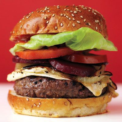 <p>Grilled onions, a fried egg, and canned beet slices are key ingredients in the sky-high Aussie burger.</p>
<p><strong>Recipe:</strong> <a href="../../../recipefinder/aussie-burgers-recipe-mslo0612" target="_blank"><strong>Aussie Burgers</strong></a></p>