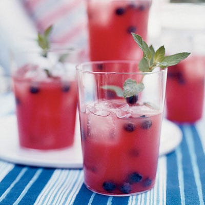 When watermelon is in abundance, this is a great way to use it. Bobby Flay purées seedless watermelon chunks, then strains the juice through a sieve and mixes it with silver tequila, sugar syrup, blueberries, mint, and fresh lime juice.
 Recipe: Watermelon-Tequila Cocktails