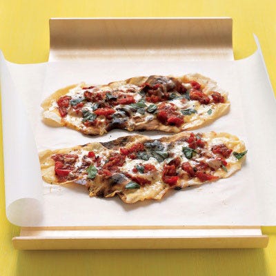 Grilled-Tomato Pizzettes with Basil and Fontina Cheese