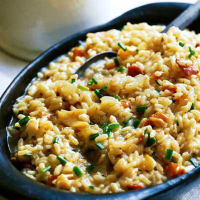 <p>If you buy just-shucked whole clams rather than already chopped clams in a container, use their liquid instead of the bottled clam juice; just be sure to strain it first through a paper towel to remove any grit.</p><p><b>Recipe:</b> <a href="/recipefinder/clam-risotto-bacon-chives-recipe-7799" target="_blank"><b>Clam Risotto with Bacon and Chives</b></a></p>