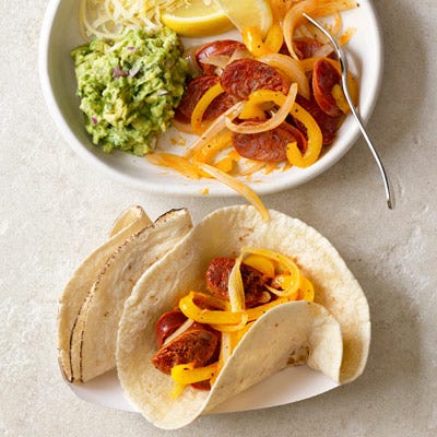 <p>Serve this spicy sausage-and-pepper sauté in <a href="/recipefinder/build-your-own-tacos-recipe-rbk0910">build-your-own-tacos</a> with assorted salsas and toppings.</p>
<p><strong>Recipe:</strong> <a href="../../../recipefinder/chorizo-tacos-recipe-rbk0910" target="_blank"><strong>Chorizo, Onions, and Peppers Tacos</strong></a></p>