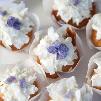 <p>"Like tiny snowcapped mountains, these cupcakes capture your heart. They look delicate and airy but have the texture and crumb of a perfect pound cake, with a sweet violet jam surprise inside." — Miche Bacher</p>
<p><strong>Recipe:</strong> <a href="../../../recipefinder/violet-flower-cupcakes-recipe-del0313" target="_blank"><strong>Violet Flower Cupcakes</strong></a></p>