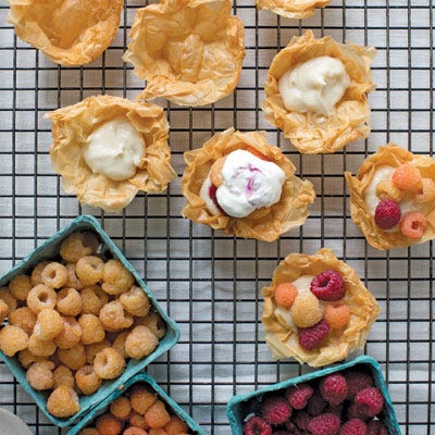 <p>"At first glance, this delicate dessert looks simple. But its few ingredients come together in a thoughtful and balanced composition, much like a good haiku. Fill crisp, delicate pastry cups with light, tart geranium pastry cream and fresh raspberries topped with geranium whipped cream, decorated with the petals of a few flowers." — Miche Bacher</p>
<p><strong>Recipe:</strong> <a href="../../../recipefinder/rose-scented-geranium-filo-cups-recipe-del0313" target="_blank"><strong>Rose-Scented Geranium Filo Cups</strong></a></p>