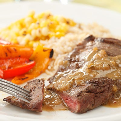 <p>Cooking whiskey removes the boozy taste, but leaves the sweet oaky flavor behind, which lends itself beautifully to tender grilled skirt steak, as we do here, or to grilled pork or chicken. Serve with baked beans and corn on the cob. </p><p><b>Recipe: <a href="/recipefinder/grilled-steak-whiskey-dijon-bbq-sauce-recipe-ew0811">Grilled Steak with Whiskey Dijon BBQ Sauce</a></b></p>