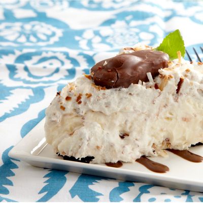 <p>This rich, creamy, fluffy pie is topped with the most decadent decoration possible — whole candy bars! Recipe Submitted by Real Women of PHILADELPHIA contestant Debbie Fabre.</p>
<p><strong>Recipe:</strong> <a href="../../../recipefinder/mounds-joy-whipped-pie-recipe-kft0212" target="_blank"><strong>Mounds of Joy Whipped Pie</strong></a></p>
