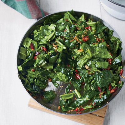 <p>You can use any greens you like in this quick sauté, which gets terrific flavor and texture from smoky bacon, hot chile, and the pop of mustard seeds.</p><p><b>Recipe: </b><a href="http://www.delish.com/recipefinder/sauteed-spring-greens-bacon-mustard-seeds-recipe-fw0613" target="_blank"><b>Sautéed Spring Greens with Bacon and Mustard Seeds</b></a></p>