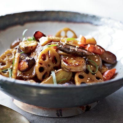 <p>In Korea, chefs typically create stir-fries with just one kind of vegetable, like lotus root. Tradition is broken here with an assortment of vegetables, including Jerusalem artichokes and parsnips.</p><p><b>Recipe:</b> <a href="http://gogonow.org/recipefinder/maple-root-vegetable-stir-fry-sesame-recipe-fw0311%22 target="_blank"><b>Maple Root-Vegetable Stir-Fry with Sesame</b></a></p>