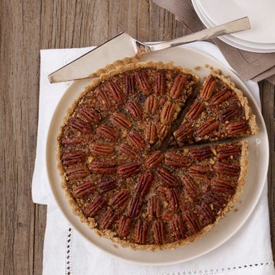 <p>This pecan tart gets added tang from dried cherries. Instead of corn syrup, which is found in most pecan pie recipes, we've opted for maple syrup. If you can find it, choose dark amber or grade B, because it has the richest maple flavor.</p>
<p><b>Recipe:</b> <a href="http://gogonow.org/recipefinder/maple-pecan-tart-dried-cherries-recipe-ew1211%22 target="_blank"><b>Maple Pecan Tart with Dried Cherries</b></a></p>