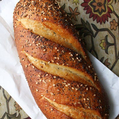 Find the Right Baguette

 Standard loaves of bread tend to be too fragile for travel. They squish, become soggy, and seep the sandwich contents everywhere. A baguette is the far superior choice for travel, because it's easy to hold and has a hardy crust that can soak up moisture.

 Here's the secret to finding the perfect baguette: choose one that is individual-sized with a soft, spongy interior and a sturdy crust. Avoid sourdough on the drier side; you want the baguette to be crusty but malleable enough to bite without using your other hand to help tear off the bread. Remember, this is a one-handed sandwich for the road!