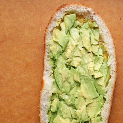 <b>Spread the Avocado</b>

If the avocado is super ripe, press and spread it into the baguette. Creating an avocado spread is the best way to prevent avocado chunks from flying out while eating the sandwich.