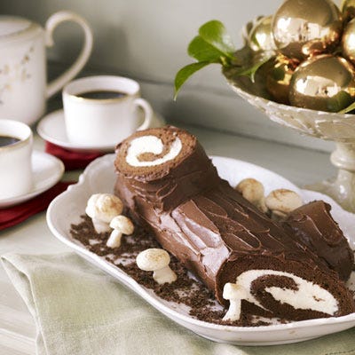 France: Bûche de Noël <p>The Bûche de Noël, or <i>branch of Christmas</i>, is the French version of a Yule Log. A rich cake filled and rolled to resemble a log, it is often decorated with tiny merinque "mushrooms" or other edible treats made to look like items found on the forest floor. In France, it is traditionally served after the Christmas Eve midnight mass, and one of the most common and classic flavors is chestnut, though today you can find them in many flavors at bakeries around France and around the world.</p><p><b>Recipe: <a href="/recipefinder/caramel-buche-noel-recipe-ghk1210">Caramel Bûche de Noël</a></b></p>