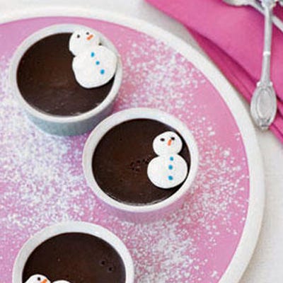 <p>Milk is the essence of many prized desserts, and creamy <a href="http://www.womansday.com/recipefinder/chocolate-pots-de-creme-121285" target="_blank">Chocolate Pots de Crème</a> are no exception. Demure-looking but decadent, they're sure to please the most finicky dinner party guest — especially once spruced up with piped whipped cream in the shape of snowmen.</p>