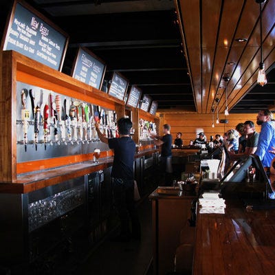 Father's Office, Los Angeles <p>Named for the place where chef-owner Sang Yoon first tasted good beer (his own father's office), the upscale pub goes by the motto "Beer Makes You Strong." Both the original Santa Monica location and the newer—and more spacious—Culver City spot have draught-dominated menus divided by beer style: malty, hoppy and yeasty/spicy, with a separate menu for rare, primarily Belgian beers like the herbaceous Brasserie DuPont Saison Foret (the world's only certified organic Belgian ale). Deciding what to eat is a much simpler endeavor: Chef Yoon's dry-aged burger topped with Gruyère and blue cheeses, arugula and applewood-bacon compote is widely regarded as one of the best in the country. <a href="http://www.fathersoffice.com"target="_blank"><i>fathersoffice.com</i></a></p>
<br />
<p>Photo: <a href="http://manggy.blogspot.com/" target="_blank">Mark Manguerra</a></p>