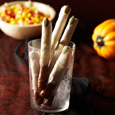 Delicious chocolate dipped pretzels are Halloween ready with the simple addition of pumpkin seeds.

 Recipe: Spooky Fingers