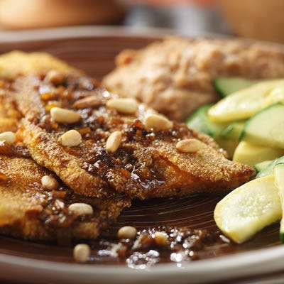 <p>This chile sauce is lighter than one you'd pair with enchiladas or burritos, but goes perfect with the delicate trout.</p>
<p><b>Recipe: <a href="/recipefinder/pan-fried-trout-red-chile-sauce-recipe-ew0910">Pan-Fried Trout with Red Chile Sauce</a></b></p>