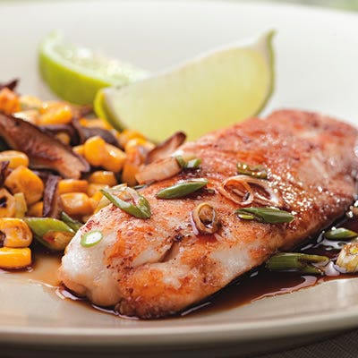 <p>Chinese five-spice powder, soy sauce, and brown sugar make a quick glaze for tilapia. You'll need a skillet that is 12 inches or larger to accommodate the pound of tilapia fillets — if you don't have one large enough, use 2 smaller skillets instead or cook them in two separate batches, using more oil as necessary.</p><p><b>Recipe: </b><a href="/recipefinder/five-spice-tilapia-recipe-ew0710" target="_blank"><b> Five-Spice Tilapia</b></a></p>