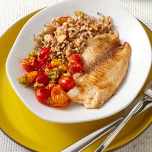 <p>Top tilapia fillets with a savory tomato-olive sauce that comes together in just 5 minutes. Look for tapenade near jarred olives in the supermarket. Serve with sautéed broccolini and farro tossed with toasted almonds.</p><p><b>Recipe: </b><a href="/recipefinder/tilapia-tomato-olive-sauce-recipe-ew0712" target="_blank"><b>Tilapia with Tomato-Olive Sauce</b></a></p>