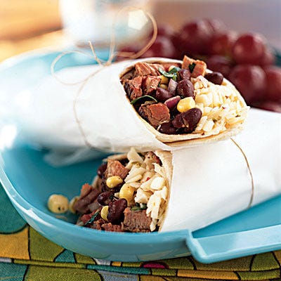 <p>Our delicious spin on steak fajitas will work for nearly every budget. Plus, they've got just 327 calories and 10.4 grams of fat (4.7 grams saturated) per serving.
</p>
<p><strong>Recipe:</strong> <a href="../../../recipefinder/southwestern-steak-corn-black-bean-wraps-recipe-cl0912" target="_blank"><strong>Southwestern Steak, Corn, and Black Bean Wraps</strong></a></p>
