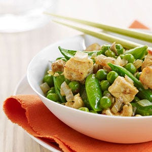 <p>Pressing tofu before making this tofu stir-fry recipe gives it a chewy, satisfying texture. Three green peas — sugar snaps, snow peas and shelling peas — balance it out with brightly flavored crunch. Hoisin — a dark brown, thick, spicy-sweet sauce made from soybeans and a complex mix of spices — gives the stir-fry rich depth of flavor with just one ingredient. Look for it, as well as chile-garlic sauce, in the Asian section of the market.</p><p><b>Recipe:</b> <a href="http://gogonow.org/recipefinder/three-pea-cashew-tofu-stir-fry-recipe-ew0812%22 target="_blank"><b>Three-Pea, Cashew, and Tofu Stir-Fry</b></a></p>
