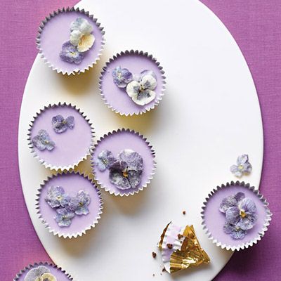 <p>These dainty confections, topped with fresh lavender-infused icing, are actually made from dark, indulgent brownie batter. Sugared pansies and violas form a glittering crown for the little cakes, which are rich enough to replace the pot of gold at the end of the rainbow.</p><p><b>Recipe: <a href="/recipefinder/spring-cupcakes-sugared-flowers-recipe" target="_blank">Spring Cupcakes with Sugared Flowers</a> </b></p>