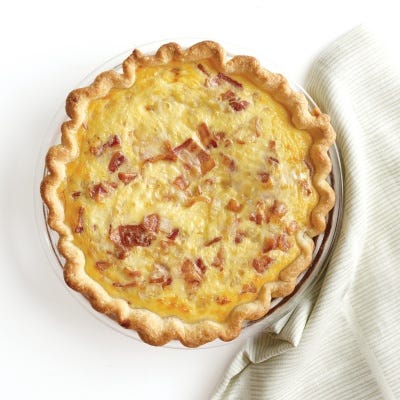 <p>This versatile dish goes from brunch buffet to dinner table in a snap and is great with a leafy green salad. The flaky crust and custard filling make it a perfect vehicle for an array of mix-ins. Baking the crust before adding the filling, known as blind baking, ensures it won't get soggy. Our favorite pie dough recipe is <a href="/recipefinder/savory-pie-crust-recipe-mslo0113">Savory Pie Crust</a>.</p>
<p><strong>Recipe:</strong> <a href="../../../recipefinder/bacon-cheese-quiche-recipe-mslo0113" target="_blank"><strong>Bacon-Cheese Quiche</strong></a></p>