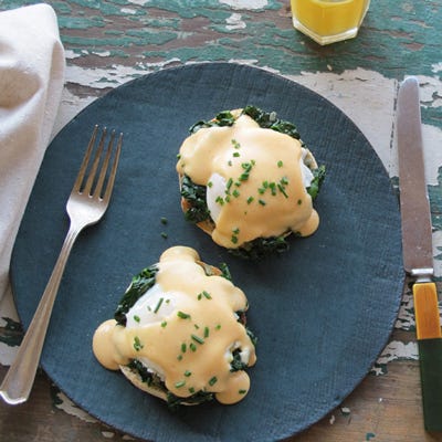 <p>This version of eggs Florentine is based on eggs Benedict: The perfectly poached eggs rest on toasted English muffins on a bed of garlicky spinach and are then topped with a light cheese sauce spiked with smoked Spanish paprika.</p><p><b>Recipe: </b><a href="/recipefinder/eggs-florentine-smoky-mornay-sauce-recipe-fw0313" target="_blank"><b>Eggs Florentine with Smoky Mornay Sauce</b></a></p>