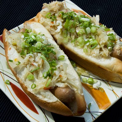 Infuse standard hot dogs with a subtle zesty kick by simmering them in beer, onions, and chiles.<br /><br />

<b>Recipe:</b> <a href="/recipefinder/hot-dogs-braised-sauerkraut-recipe-top1011" target="_blank"><b>Hot Dogs with Beer-Braised Sauerkraut</b></a>