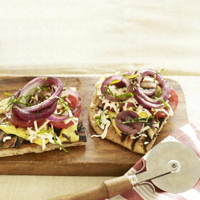 <p>Everyone's favorite takeout gets a low-cal, high-fiber makeover with a heap of veggies — sweet from a turn on the grill — a whole wheat crust, and a sprinkle of cheese.</p>
<p><strong>Recipe:</strong> <a href="../../../recipefinder/grilled-veggie-pizza-recipe-ghk0810" target="_blank"><strong>Grilled Veggie Pizza</strong></a></p>
