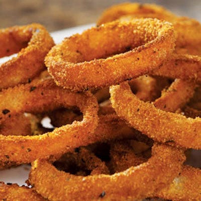 <p>We couldn't get enough of these crunchy onion rings in the EatingWell Test Kitchen. Try any seasoning blend that you have on hand to add flavor to the breading or substitute 1 teaspoon salt instead. Seasoned whole-wheat breadcrumbs are available in some supermarkets and natural-foods stores. If you can find them, try them in place of the plain breadcrumbs and seasoning blend.</p>
<p><strong>Recipe:</strong> <a href="../../../recipefinder/onion-rings-recipe" target="_blank"><strong>Onion Rings</strong></a></p>
