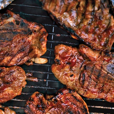 <p>Garlic and sage, rubbed into the pork ahead of time, impart an earthy, aromatic flavor. The meat is then moistened by a beer marinade and basted on the grill with a thick, tangy tomato-based sauce.</p><p><b>Recipe:</b> <a href="/recipefinder/barbecued-pork-shoulder-chops-recipe-mslo0810" target="_blank"><b>Barbecued Pork-Shoulder Chops</b></a></p>